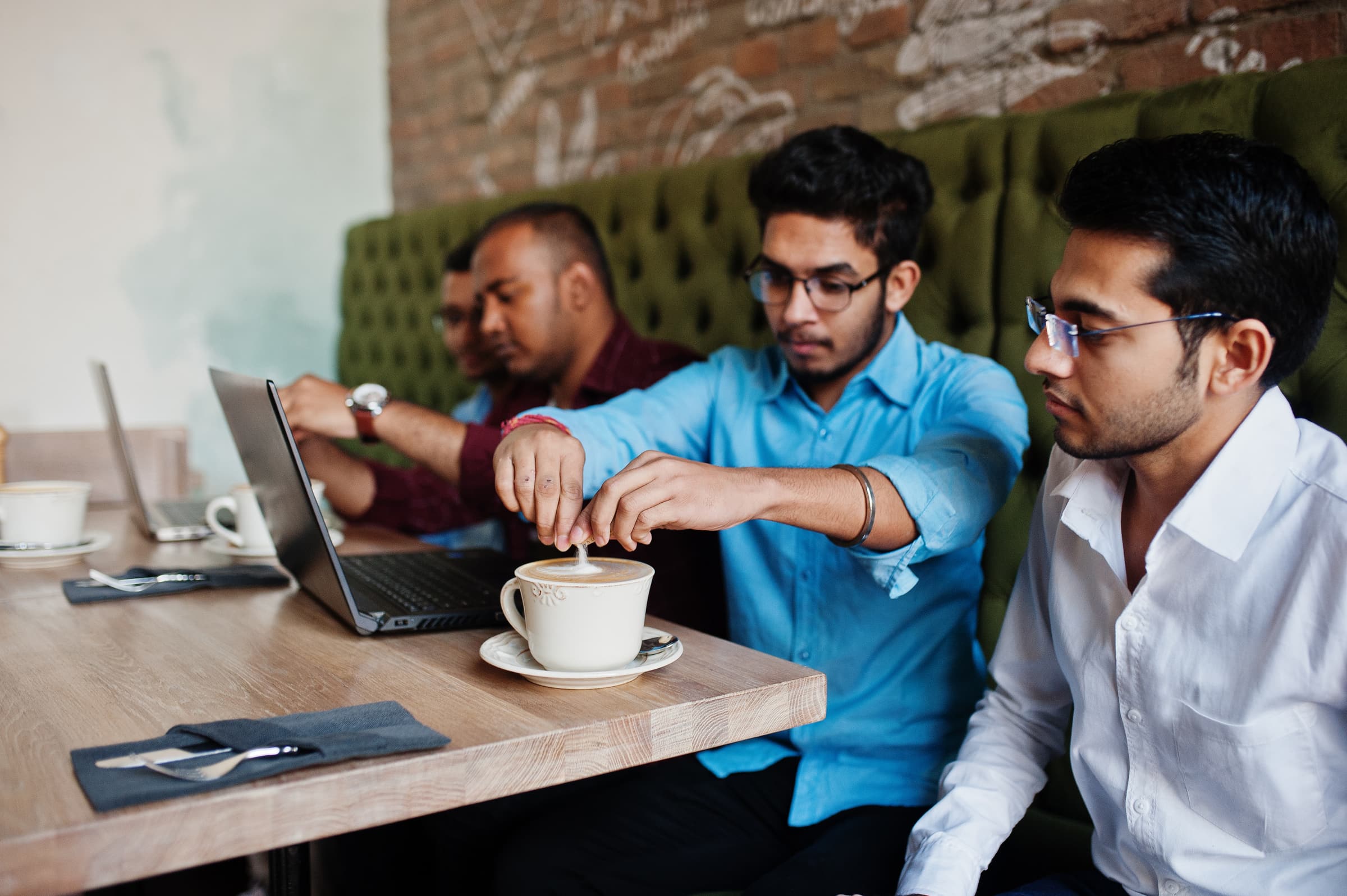 People working through a build together